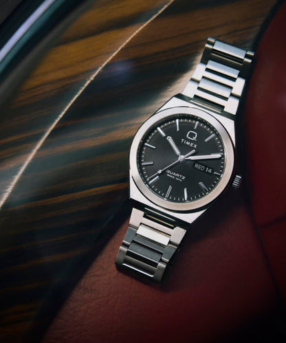 Timex Q Timex Continental Day and Date 39mm Stainless Steel Bracelet Watch